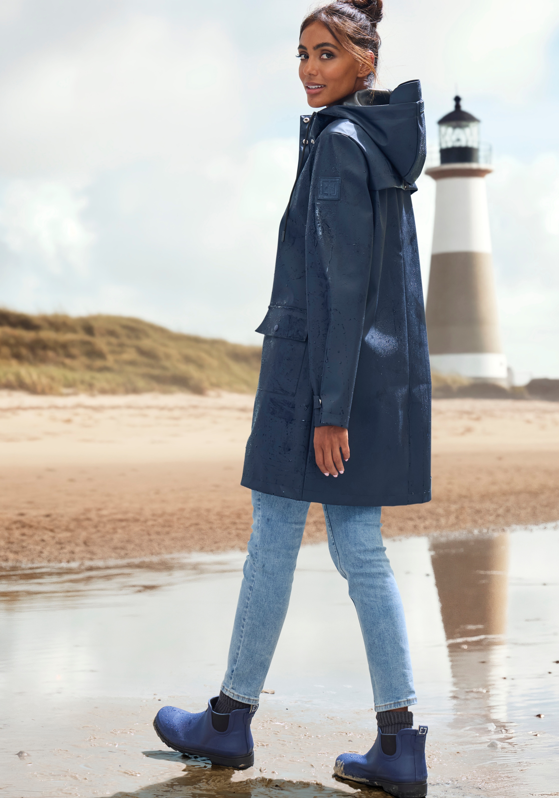 Elbsand Regenjacke mit Kapuze Mesh-Einsatz unter der Rückenpasse für ausreichende Belüftung